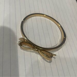 Kate Spade Gold-tone Polished Bow Ribbon Bangle Bracelet
